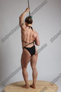 2021 05 KAROLINA STANDING HOLDING SWORD (4)